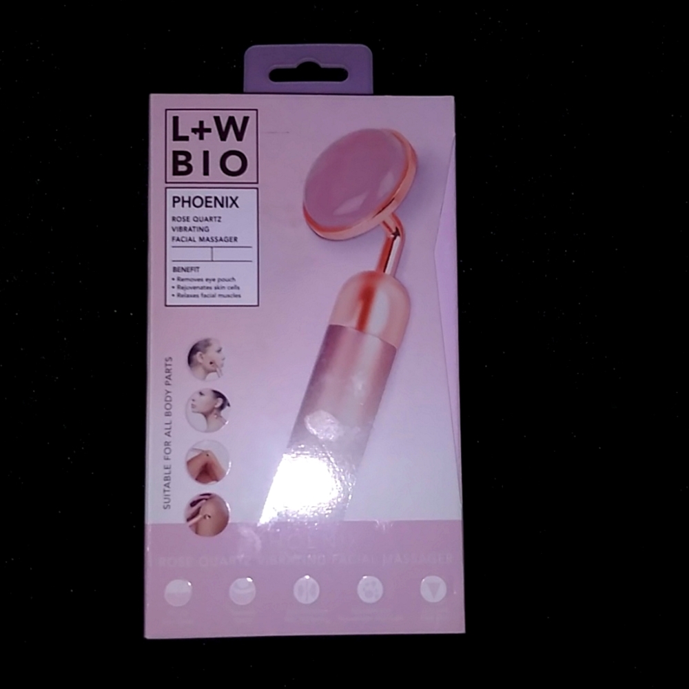 Rose quartz vibrating face massager
